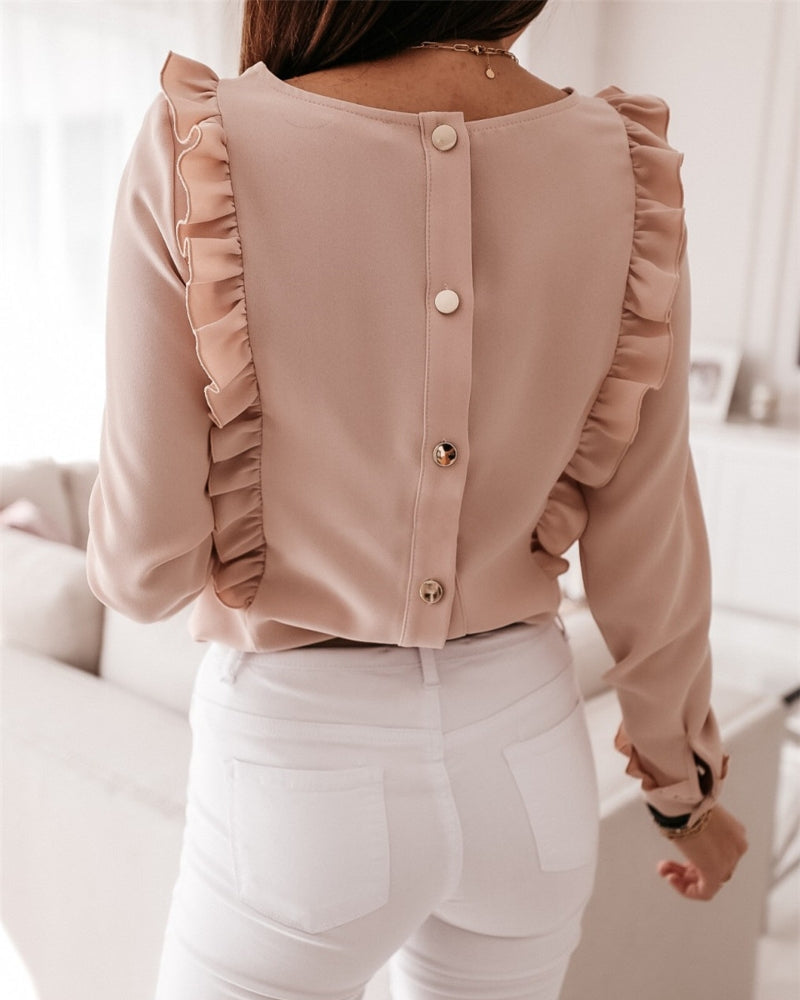 Elegante blouse met ruches en knopen